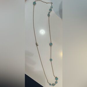 Long necklace with blue stone